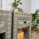 Pair of rustic solid wooden bedside tables painted green with bone inlay pattern