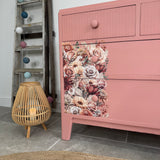 Colourful pink retro chest of drawers with florals