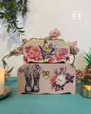 Pair of wooden trinket boxes painted pink and floral