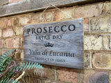 White washed rustic wooden ‘Prosecco’ wall sign