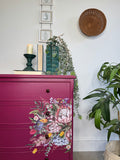 Bright pink and floral vintage bow fronted chest of drawers