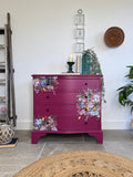 Bright pink and floral vintage bow fronted chest of drawers