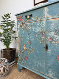Vintage Cottage Style Console Cabinet / Sideboard painted in rustic chippy blue with birds and florals