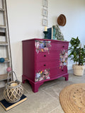 Bright pink and floral vintage bow fronted chest of drawers