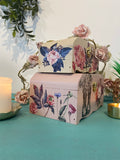 Pair of wooden trinket boxes painted pink and floral