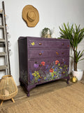 Vintage chest of drawers painted in dark plum purple with florals