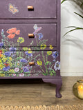 Vintage chest of drawers painted in dark plum purple with florals